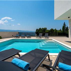 5 bedroom beachfront villa with heated pool near Omis, sleeps 9